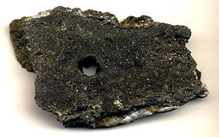 Probe eines "Schwarzen Rauchers" vom Boden der irdischen Tiefsee. © Pinter